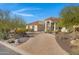 Beautiful home featuring circular drive, desert landscaping, and an inviting entrance at 8540 E Mcdowell Rd # 10, Mesa, AZ 85207
