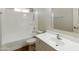 Bathroom featuring a shower-tub combo and a modern vanity at 8571 N 83Rd Dr, Peoria, AZ 85345