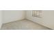 Bedroom with carpet and window, offering natural light and comfortable living space at 8571 N 83Rd Dr, Peoria, AZ 85345