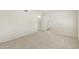 Spacious bedroom leads to a bathroom, offering comfort and convenience at 8571 N 83Rd Dr, Peoria, AZ 85345