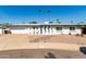 Charming single-story home featuring a two car garage and a desert landscape at 8714 E Mackenzie Dr, Scottsdale, AZ 85251