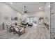 Spacious living room boasting high ceilings, modern decor, recessed lights, and large sliding glass doors at 8941 E Maple Dr, Scottsdale, AZ 85255