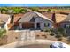 Inviting single-story home with well-maintained landscaping, private backyard, and desert views at 9310 W Atlantis Way, Tolleson, AZ 85353