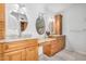 Primary bathroom with dual sinks, granite counters, and vanity area at 10511 N 87Th Way, Scottsdale, AZ 85258