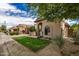 Residential street view showing a well-manicured lawn and tasteful landscaping at 10511 N 87Th Way, Scottsdale, AZ 85258
