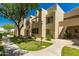 Exterior view of condo features mature landscaping, stairs to upper levels and easy access at 11333 N 92Nd St # 2072, Scottsdale, AZ 85260