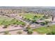 Wide aerial view of a community clubhouse, golf course, and surrounding neighborhood at 11360 E Keats Ave # 70, Mesa, AZ 85209