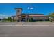 Community clubhouse shows large building exterior and handicap parking in front at 11360 E Keats Ave # 70, Mesa, AZ 85209