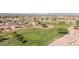 Scenic aerial view of a lush golf course green in a well-maintained community at 11360 E Keats Ave # 70, Mesa, AZ 85209