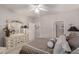 Inviting main bedroom showcasing a dresser with mirror and a serene atmosphere, with ensuite bathroom at 11360 E Keats Ave # 70, Mesa, AZ 85209
