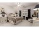 Serene main bedroom with neutral tones, a ceiling fan, and window shutters, creating a relaxing atmosphere at 11360 E Keats Ave # 70, Mesa, AZ 85209