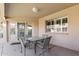 Covered patio featuring an outdoor dining table set, providing a perfect space for al fresco dining and relaxation at 11360 E Keats Ave # 70, Mesa, AZ 85209
