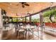Spacious outdoor patio featuring ceiling fans, stone columns, and community seating at 11360 E Keats Ave # 70, Mesa, AZ 85209
