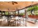 Spacious outdoor patio featuring ceiling fans, stone columns, and community seating at 11360 E Keats Ave # 70, Mesa, AZ 85209