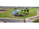Scenic pond with rocks and small waterfalls, enhancing the golf course's beauty at 11360 E Keats Ave # 70, Mesa, AZ 85209