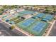 Aerial view of multiple blue and green tennis courts at the community recreational center at 11360 E Keats Ave # 70, Mesa, AZ 85209