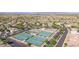 Aerial view of a community with well-maintained tennis courts and neighborhood streets at 11360 E Keats Ave # 70, Mesa, AZ 85209