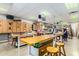 Spacious woodworking shop with work tables, storage cabinets, and community members at 11360 E Keats Ave # 70, Mesa, AZ 85209