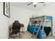 Comfortable bedroom featuring bunk beds, a workspace, and calming decor at 12269 E Chiricahua Pl, Gold Canyon, AZ 85118
