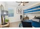 Bright bedroom with a bunk bed, desk area, and stylish decor for a space at 12269 E Chiricahua Pl, Gold Canyon, AZ 85118