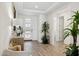 Stylish entryway featuring wood-look flooring, modern decor, and a bright, welcoming ambiance at 12269 E Chiricahua Pl, Gold Canyon, AZ 85118