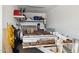 Garage has added storage with overhead shelves, plus a trailer for hauling large items at 12269 E Chiricahua Pl, Gold Canyon, AZ 85118