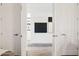 Inviting hallway with decorative art, hardwood floors, and closet storage space at 12269 E Chiricahua Pl, Gold Canyon, AZ 85118
