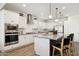 Modern kitchen features granite countertops, stainless steel appliances, a spacious island, and plenty of cabinet space at 12269 E Chiricahua Pl, Gold Canyon, AZ 85118