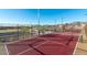 Outdoor pickleball courts in a community with desert landscaping and mountain views at 12269 E Chiricahua Pl, Gold Canyon, AZ 85118
