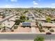 Neighborhood view of a home with solar panels, lush trees, mountain views, and convenient street access at 12447 N 50Th Ln, Glendale, AZ 85304