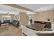 Cozy living room boasts hardwood floors and a spacious layout that leads to the backyard at 12447 N 50Th Ln, Glendale, AZ 85304