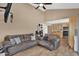 Comfortable living room shows high ceilings, hardwood floors, and flows into the kitchen at 12447 N 50Th Ln, Glendale, AZ 85304