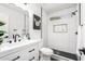 Modern bathroom featuring a sleek vanity, tiled shower, and stylish fixtures at 12506 W Corrine Dr, El Mirage, AZ 85335