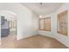 Inviting dining area with natural light, neutral paint, and stylish pendant lighting fixture at 13145 W Cambridge Ave, Goodyear, AZ 85395