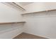 Spacious walk-in closet with ample shelving and hanging space at 13145 W Cambridge Ave, Goodyear, AZ 85395