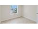 A well lit bedroom showcases tile flooring, baseboards, and light walls at 13816 N 46Th St, Phoenix, AZ 85032