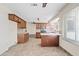 A kitchen with wood cabinets, tile backsplash, and stainless steel appliances at 13816 N 46Th St, Phoenix, AZ 85032