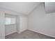 Carpeted bedroom with a window and a large closet with sliding doors, perfect for a cozy retreat at 14002 N 49Th Ave # 1040, Glendale, AZ 85306