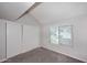 Bright, carpeted bedroom featuring a window and a closet with sliding doors, great for storage at 14002 N 49Th Ave # 1040, Glendale, AZ 85306