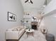 Bright living room with vaulted ceiling, modern decor, and fireplace creating a cozy and inviting space at 14002 N 49Th Ave # 1040, Glendale, AZ 85306