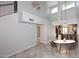 Spacious living room with high ceilings, neutral colors, tile floors, and an open layout perfect for entertaining at 14002 N 49Th Ave # 1040, Glendale, AZ 85306