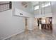 Inviting living room with high ceilings, tile floors, and an open layout for seamless entertaining at 14002 N 49Th Ave # 1040, Glendale, AZ 85306