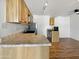 A modern kitchen featuring stainless steel appliances and granite countertops at 1440 N Idaho Rd # 1048, Apache Junction, AZ 85119