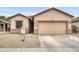 Charming single-story home with a two-car garage and low maintenance desert landscaping at 15339 W Jefferson St, Goodyear, AZ 85338