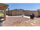 Spacious backyard with desert landscaping, patio, and storage shed at 19202 N 14Th St, Phoenix, AZ 85024
