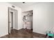 Bright bedroom with wood floor, closet with organization and shelves at 19202 N 14Th St, Phoenix, AZ 85024