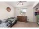 Bedroom with a ceiling fan, window for natural light, and a closet at 19202 N 14Th St, Phoenix, AZ 85024