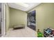 Bonus room with tile floors and backyard views through the sliding glass door at 19202 N 14Th St, Phoenix, AZ 85024