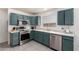 Updated kitchen with stainless steel appliances and granite counters at 19202 N 14Th St, Phoenix, AZ 85024