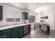 This kitchen showcases a breakfast nook, neutral decor, ample countertop space and modern appliances at 19202 N 14Th St, Phoenix, AZ 85024